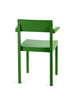 Minimalistic chair in green colour on a white background.