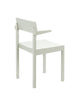 White dining chair with arm rests on a white background.