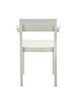 White dining chair with arm rests on a white background. View from behind.