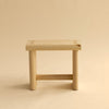 001 Ast Stool by Vaarnii in Finland. Studio image. View from the front. Beige background.