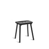 Gorgeous little stool. Legs are made from black metal while the seat is made from black wood. White background.