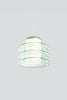 Modern pendant light with green glass shades on a white background