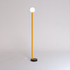 Off center floor lamp