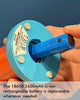 How to change the rechargeable battery in a George Sowden table lamp. Close up shot. The base of the lamp is baby blue and the battery is blue.
