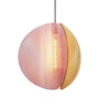 An elegant pendant light in pink and brass on a white background.