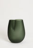 Dark green handmade glass vase. White background.