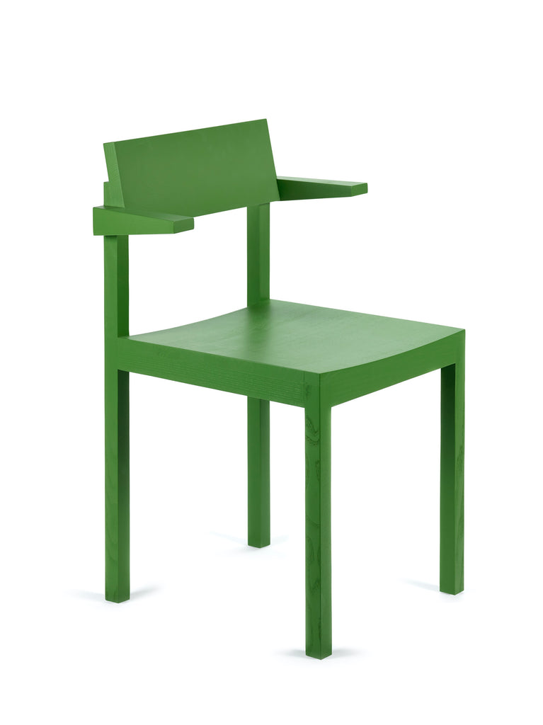 Product image. Green, wooden dining chair with arm rests on a white background. View of the chair is approximately 45 degrees.