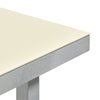 A close up image of the corner of a minimalistic aluminium dining table. Table top in ivory colour. White background.