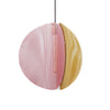 Pendant light in pink, brass and grey on a white background. The light is turned off.