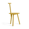 Turmeric yellow dining chair on a white background.