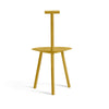 Turmeric yellow dining chair on a white background. View from behind.