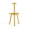 Turmeric yellow dining chair on a white background. View from behind.