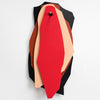 A set of five cutting boards hung on a wall as a decoration. Each board has a different uneaven shape and colour. White background.